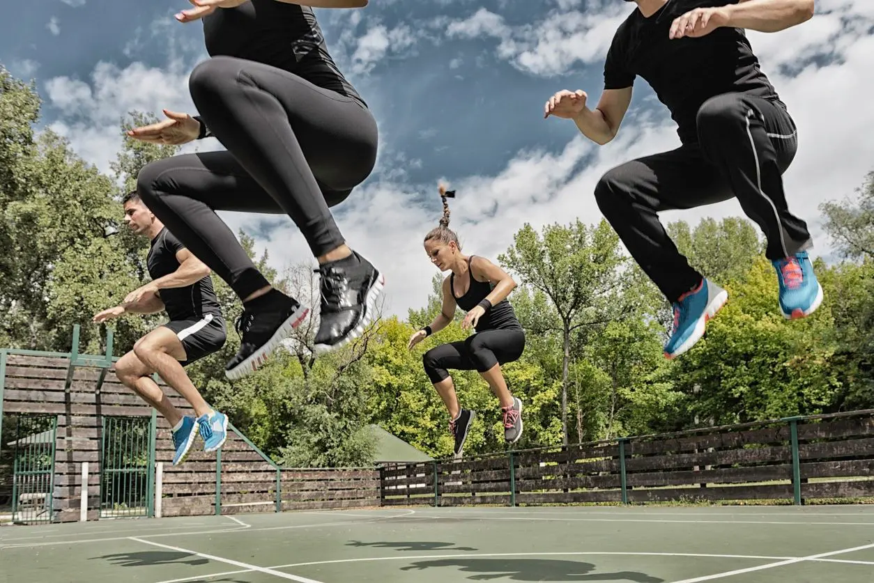 Power jump exercise on insanity training outdoors Power jump exercise on insanity training outdoors